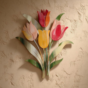 Pastel tulip stem metal wall art with colorful floral botanical design mounted on textured wall 1
